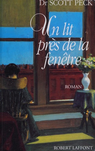 Un lit près de la fenêtre