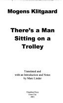 There's a man sitting on a trolley